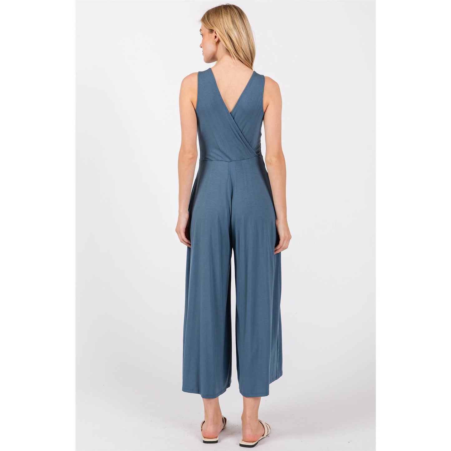 SURPLICE SLEEVELESS WIDE LEG JUMPSUIT