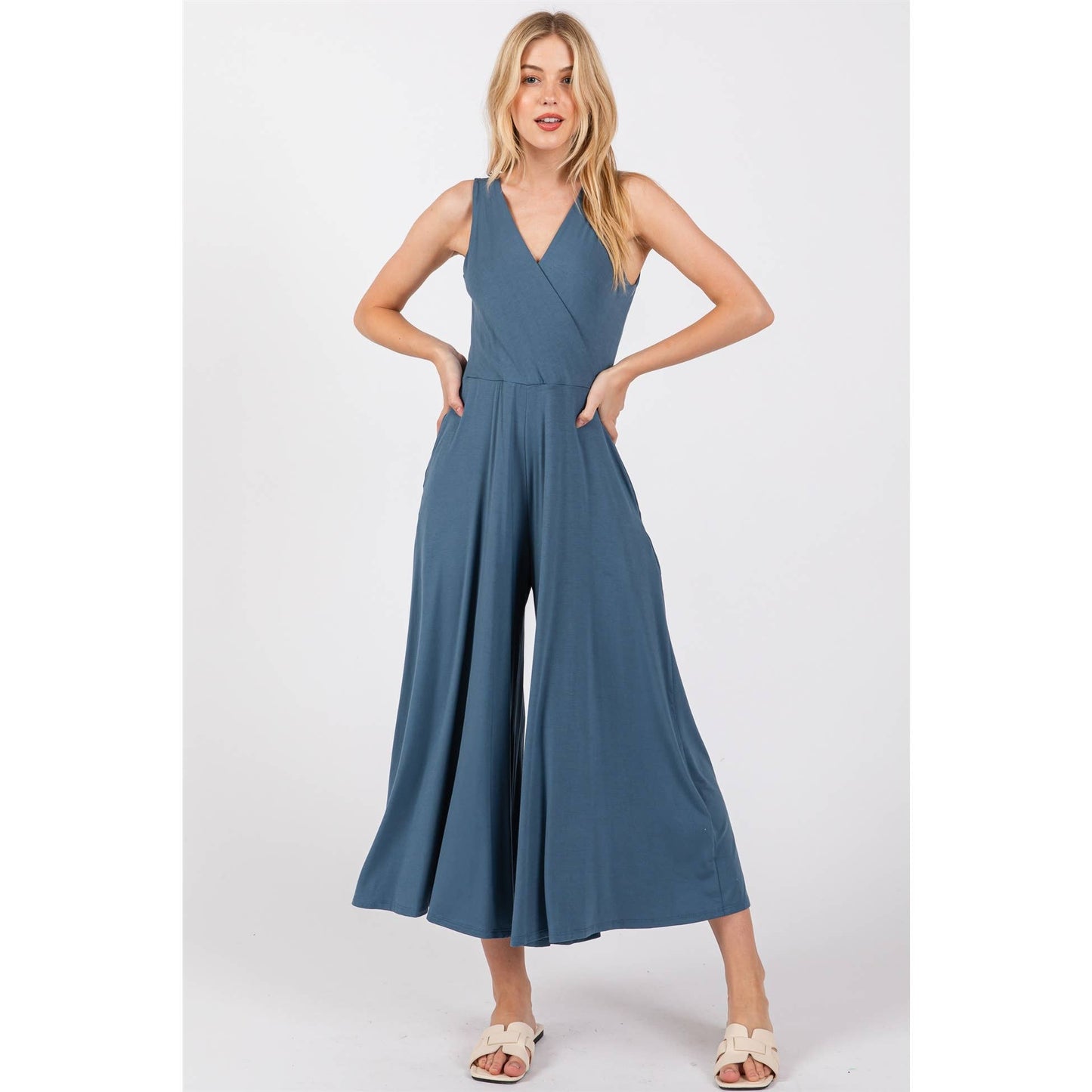 SURPLICE SLEEVELESS WIDE LEG JUMPSUIT