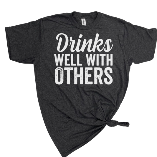 DRINKS WELL WITH OTHERS T-SHIRT